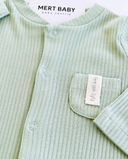 Picture of Green corduroy overalls (3-6 months).